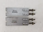 Pair Of Vintage Micamold CP07SD3 Capacitor Mounting Brackets Used. Price: $19.95.