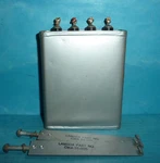 Cornell Dubilier Oil Can Capacitor 4/4/2UF 600VDC W/ Mounts Used. Price: $25.46.