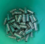 49 Vintage Sprague 34D Axial Electrolytic Capacitors 1UF 450V Dc (CE13C1R0R) Nos New. Price: $75.00.