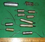 (12) Gudeman .1UF Mil Spec Hermetically Sealed Caps Various Voltages Open. Price: $17.99.